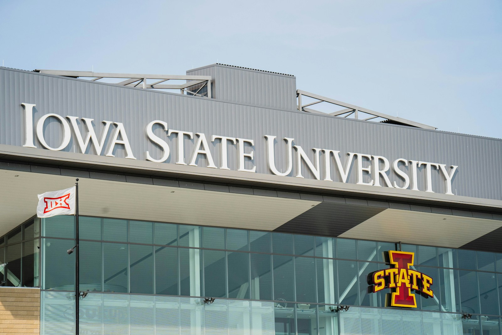 the iowa state university sign on top of a building